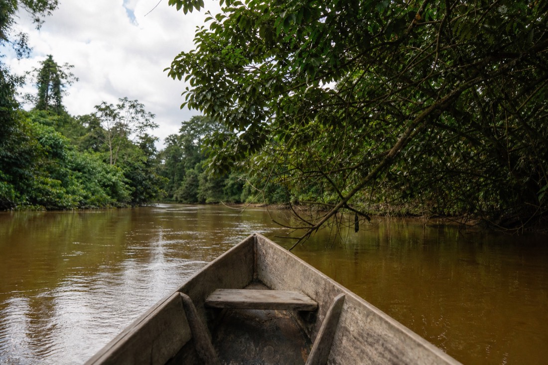 Wooden riverboat heading up an Amazon tributary near Tamshiyacu, the boat leg that brings guests from Iquitos to jungle retreat centers